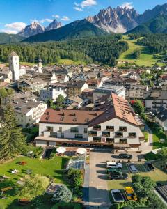 an aerial view of a town with mountains in the background at Il Tyrol in San Candido