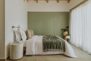 Posteľ alebo postele v izbe v ubytovaní BATU Luxury Apartments