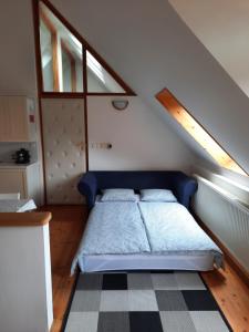 Postel nebo postele na pokoji v ubytování Mon-Csa Studio Apartman