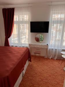 TV/Unterhaltungsangebot in der Unterkunft ART HOTEL HOUSE ONE