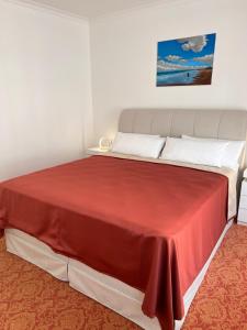 Ein Bett oder Betten in einem Zimmer der Unterkunft ART HOTEL HOUSE ONE