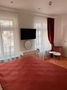 TV/Unterhaltungsangebot in der Unterkunft ART HOTEL HOUSE ONE