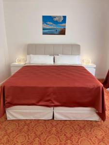 Ein Bett oder Betten in einem Zimmer der Unterkunft ART HOTEL HOUSE ONE