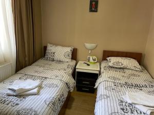 Hotel Maria客房内的一张或多张床位
