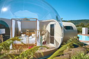 a round house with a bed inside of it at Cuore del Cilento Relais&Retreat in Castellabate