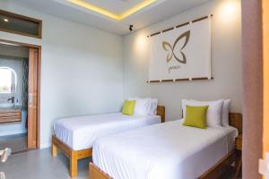 Giường trong phòng chung tại Bali Harmony Retreat +47 ảnh