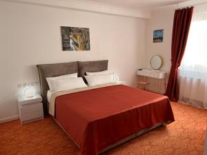Ein Bett oder Betten in einem Zimmer der Unterkunft ART HOTEL HOUSE ONE