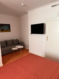 TV/Unterhaltungsangebot in der Unterkunft ART HOTEL HOUSE ONE
