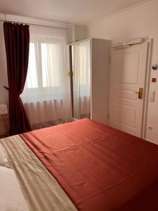 Ein Bett oder Betten in einem Zimmer der Unterkunft ART HOTEL HOUSE ONE