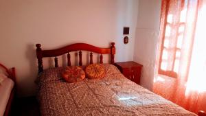 เตียงในห้องที่ Casa Ayacucho