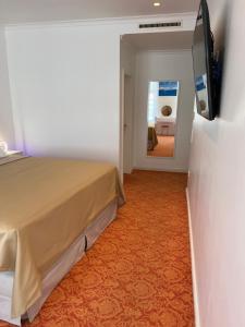 Ein Bett oder Betten in einem Zimmer der Unterkunft ART HOTEL HOUSE ONE