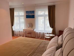 Ein Bett oder Betten in einem Zimmer der Unterkunft ART HOTEL HOUSE ONE