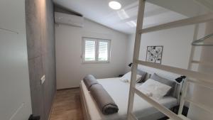 Voodi või voodid majutusasutuse Lux apartments Kumbor toas