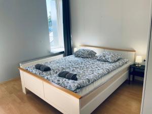 Postel nebo postele na pokoji v ubytování Tallinn Seaside Apartment