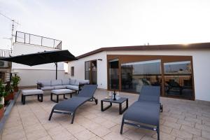 Patio nebo venkovní prostory v ubytování Mansarda Monache (M&M)