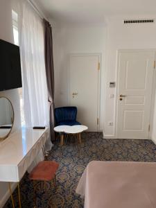 Ein Bett oder Betten in einem Zimmer der Unterkunft ART HOTEL HOUSE ONE