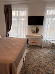TV/Unterhaltungsangebot in der Unterkunft ART HOTEL HOUSE ONE