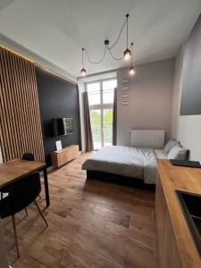 Posteľ alebo postele v izbe v ubytovaní Property Apart - plac Jana Pawla II Centrum