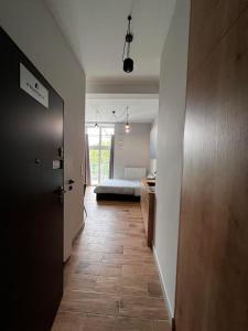 Posteľ alebo postele v izbe v ubytovaní Property Apart - plac Jana Pawla II Centrum