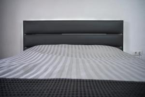Łóżko lub łóżka w pokoju w obiekcie Casa Lumbreras