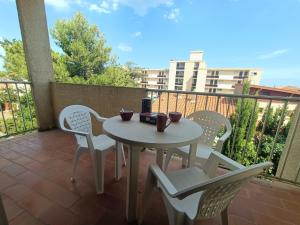 Balkon lub taras w obiekcie Appartement pour 4 personnes à 50m de la plage Narbonne Plage 4LP2A8