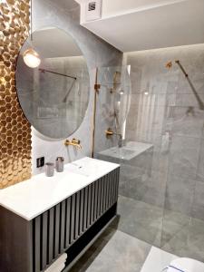 Kúpeľňa v ubytovaní Apartament Zamojski Rynek 21