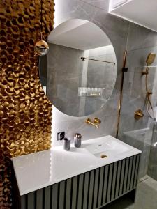 Kúpeľňa v ubytovaní Apartament Zamojski Rynek 21