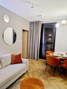 Posedenie v ubytovaní Apartament Zamojski Rynek 21