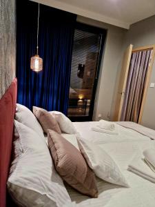 Posteľ alebo postele v izbe v ubytovaní Apartament Zamojski Rynek 21