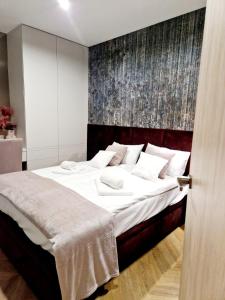 Posteľ alebo postele v izbe v ubytovaní Apartament Zamojski Rynek 21