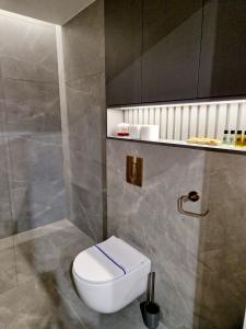 Kúpeľňa v ubytovaní Apartament Zamojski Rynek 21