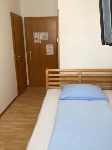 Postel nebo postele na pokoji v ubytování Hotel Pribitzer
