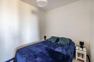 En eller flere senge i et værelse på Le front de mer