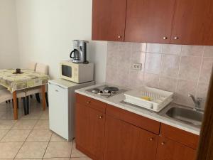 Kuchyňa alebo kuchynka v ubytovaní Sobe i Apartmani TIL