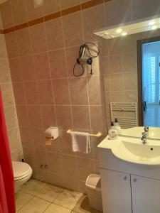 Kúpeľňa v ubytovaní Sobe i Apartmani TIL