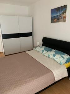 Posteľ alebo postele v izbe v ubytovaní Sobe i Apartmani TIL