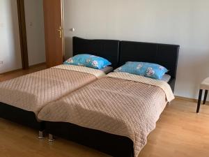 Posteľ alebo postele v izbe v ubytovaní Sobe i Apartmani TIL