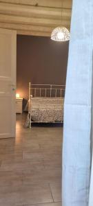 Postel nebo postele na pokoji v ubytování Loft Ballarò