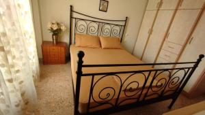 A bed or beds in a room at Anastasia's House near Kalamata