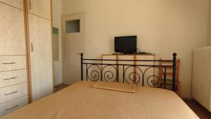 A bed or beds in a room at Anastasia's House near Kalamata
