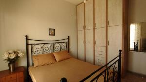 A bed or beds in a room at Anastasia's House near Kalamata