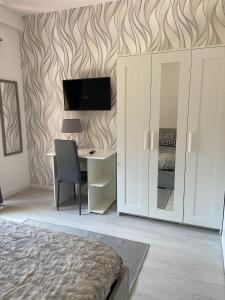 Телевизор и/или развлекательный центр в Dream house... Cerveteri!