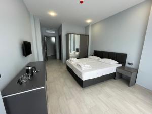 Postel nebo postele na pokoji v ubytování Hotel Biota
