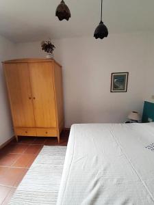 Postel nebo postele na pokoji v ubytování Sa Mannalissa casa vacanza