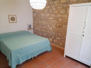 Postel nebo postele na pokoji v ubytování Sa Mannalissa casa vacanza