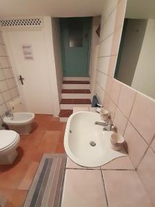 Koupelna v ubytování Sa Mannalissa casa vacanza