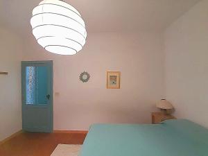 Postel nebo postele na pokoji v ubytování Sa Mannalissa casa vacanza