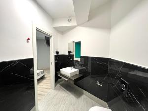 Vannituba majutusasutuses Siclari B&B-Rooms&Suite
