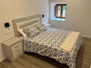 Postel nebo postele na pokoji v ubytování Palacio de Cambre