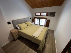 Postel nebo postele na pokoji v ubytování Palacio de Cambre